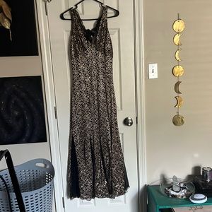 Black and gold lace evening gown